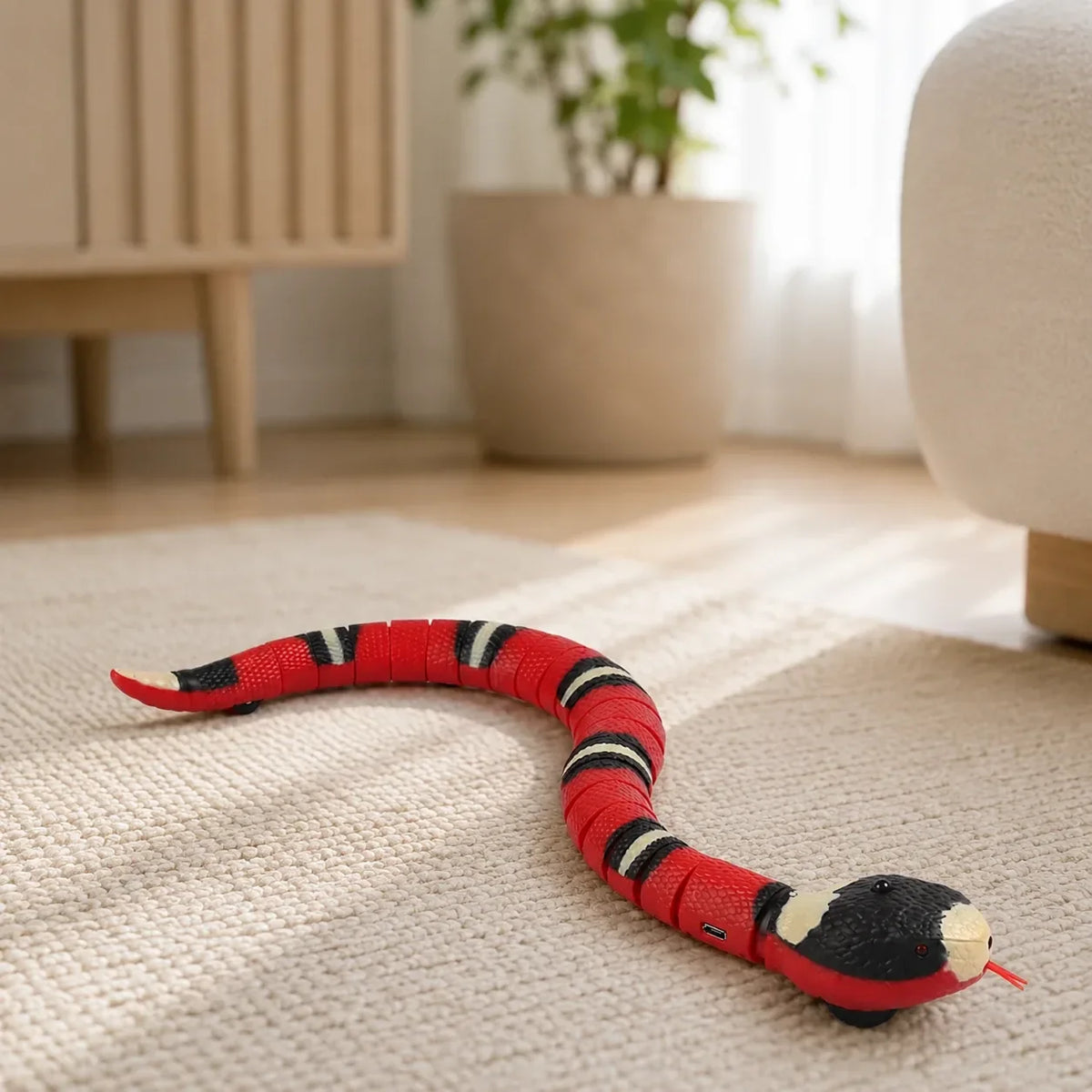 Smart sensing snake cat toy