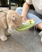 One-hand squeeze pours fresh water for a cat on a walk