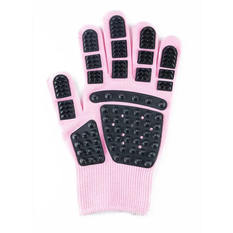Cat grooming glove in pink, right hand, isolated