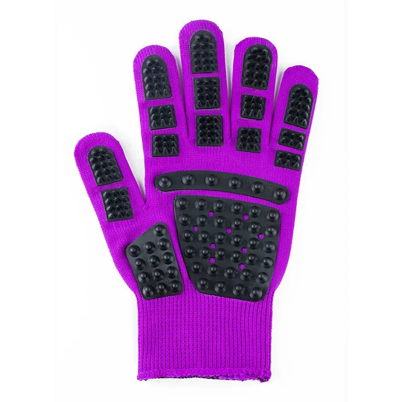 Cat grooming massage glove in purple, isolated