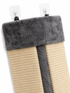 Close-up of the two adhesive hooks that hang the corner scratcher without drilling