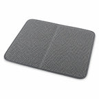 Double-layer honeycomb cat litter mat in grey, isolated