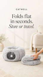 The plush donut cat bed folds flat in seconds for storage or travel