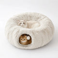 Plush donut cat tunnel bed with one cat napping on the top bed and another inside the tunnel