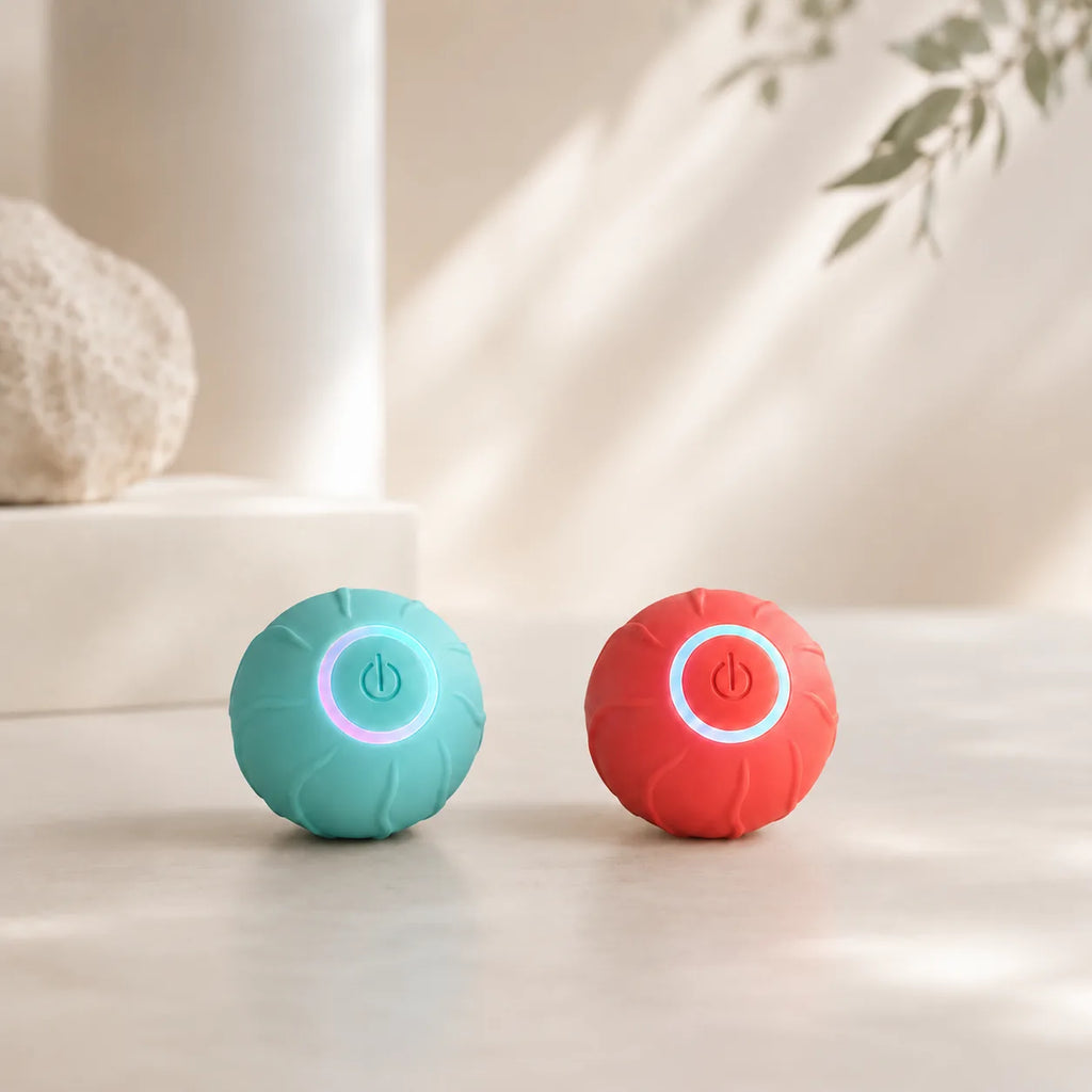 Blue and red smart rolling cat balls side by side with LED rings